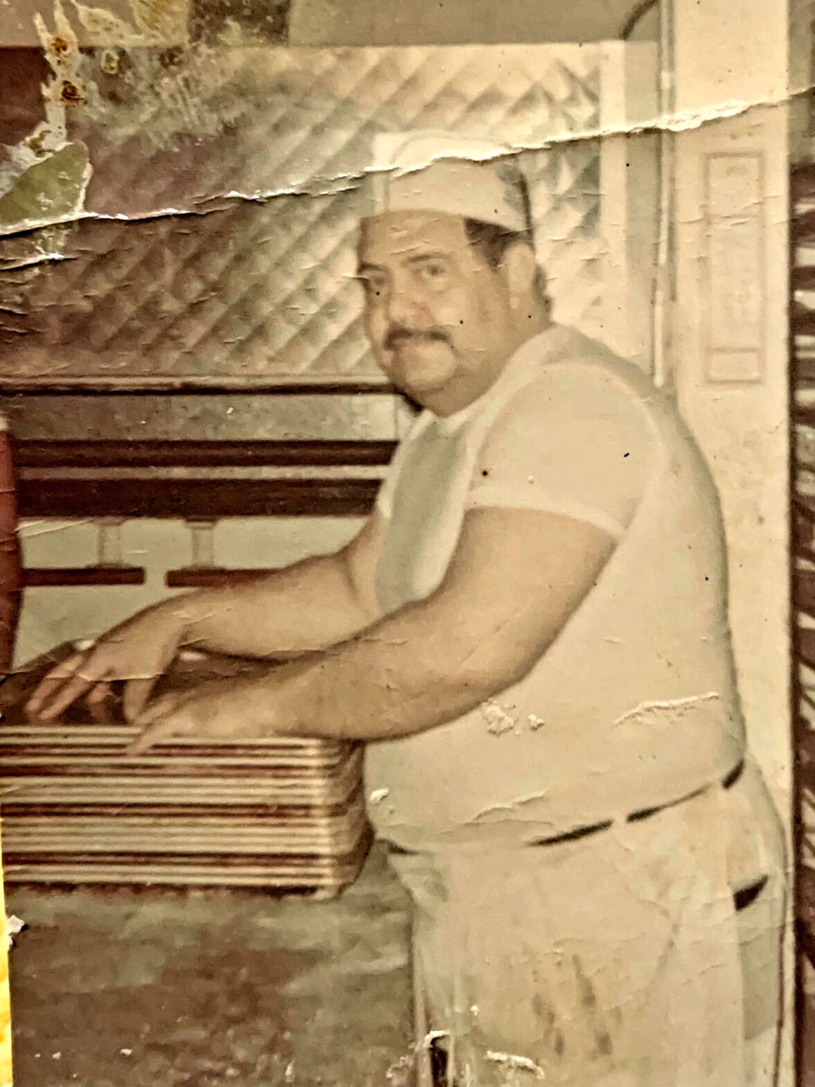 Huerta's uncle Lauro working at El Gallo Bakery